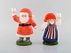 Lisa Larson for Goebel. A pair of rare candlesticks in glazed porcelain. Santa 
and his wife. Dated 1987.
