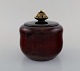 Patrick Nordstrøm / Carl Halier for Royal Copenhagen. Glazed ceramic vase with 
bronze lid. 1920