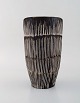 Danish ceramist. Large glazed ceramic vase with fluted body. 1960 / 70