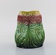 Antique Höganäs art nouveau vase in glazed ceramics decorated with sunflowers. 
Early 20th century.
