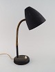 Adjustable retro table lamp in original black with switch on the foot. 1960