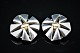 Georg Jensen, Regitze Overgaard; A pair of earclips of sterling silver set with 
18k gold #311