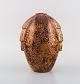 Sevres, France. Art deco vase in glazed ceramic. Beautiful metallic glaze in 
golden and reddish brown shades. 1930