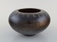 European studio ceramist. Unique bowl in glazed ceramics with grooved design. 
1970