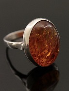 Sterling sølv ring størrelse 56 med rav. 