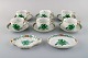 Herend "Chinese bouquet" coffee service for six people in porcelain with gold 
decoration and green flowers. Mid 20th century.
