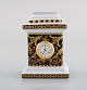 Gianni Versace for Rosenthal. Barocco miniature clock in porcelain with gold 
decoration. Late 20th century.
