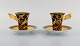 Gianni Versace for Rosenthal. Two Barocco coffee cups with saucers in porcelain 
with gold decoration. Late 20th century.
