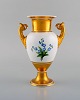 KPM, Berlin. Antique empire vase with flowers and gold decoration. 19th century.
