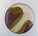 Europæisk studio keramiker. Unika fad i glaseret keramik. Dateret 1985. Smuk 
glasur i grå og olivengrønne toner.
