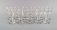 Baccarat, France. 11 "Harcourt 1841" glasses in mouth blown crystal glass. 
Mid-20th century.

