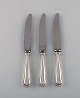 Cohr, Danish silversmith. Three lunch knives in silver (830) and stainless 
steel. 1930