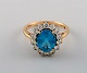 Vintage art deco ring in 9 carat gold adorned with several semi-precious stones. 
1940