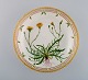 Large Royal Copenhagen Flora Danica porcelain bowl decorated in colours and gold 
with flowers. Model number 20/3505. 
