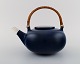 Saxbo teapot in glazed ceramics and spout with silver mounting. 1940