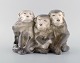 Knud Kyhn for Royal Copenhagen. Rare porcelain figure in the shape of three 
monkeys. Model number 1454/940. Early 20th century.
