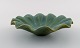 Arne Bang. Bowl in glazed ceramic with wavy edge. Model number 130. Beautiful 
glaze in shades of green. 1940 / 50s.
