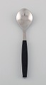 Henning Koppel for Georg Jensen. Strata teaspoon in stainless steel and black 
plastic. 1960 / 70s. 13 pcs in stock.
