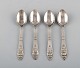 Four rare Georg Jensen Bell coffee spoons in sterling silver.
