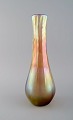 Large Tiffany Favrile vase in iridescent art glass. Early 20th century.
