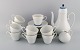 Bjørn Wiinblad for Rosenthal. Romanze coffee service in white porcelain with 
blue decoration for twelve people. 1980s.
