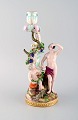 Antique Meissen figural candlestick in hand-painted porcelain. Model number 
1190.
