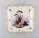 Antique Meissen dish / bowl in hand-painted porcelain. Romantic scenery with 
noble couple, butterflies and flowers. 19th century.
