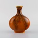 Sevres, France. Art deco vase in glazed ceramics. Beautiful glaze in orange 
shades. 1920 / 30s.

