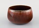 Carl Harry Stålhane for Rörstrand. Bowl in glazed ceramics. Beautiful glaze in 
reddish brown shades. Mid-20th century.
