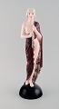 Josef Lorenzl for Goldscheider, Austria. Art deco figure in glazed ceramics. 
Half-naked woman in robe. 1930 / 40s.
