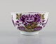 rare antique Meissen tea cup in hand-painted porcelain with purple flowers and 
gold decoration. 18/19th century.
