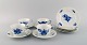 Four Royal Copenhagen Blue Flower angular teacups with saucers in porcelain and 
four plates. Model number 10/8500.
