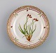 Royal Copenhagen Flora Danica side plate in hand-painted porcelain with flowers 
and gold decoration. Model number 20/3552.
