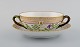 Royal Copenhagen Flora Danica boullion cup with saucer in hand-painted porcelain 
with branch-shaped handles, flowers and gold decoration. Model number 20/3612.
