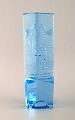 Christer Sjögren for Lindshammar. Large glass sculpture in light blue mouth 
blown art glass. Limited edition XX / 450. Dated 1990.
