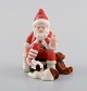 Royal Copenhagen porcelain figurine. "The Annual Santa". Limited edition. Dated 
2012.
