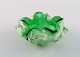 Murano bowl in green and clear mouth blown art glass. Wavy shape. Italian 
design, 1960s.
