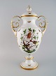 Colossal Herend ornamental vase with handles in hand-painted porcelain with 
birds, butterflies and gold decoration. Mid-20th century.
