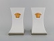 Gianni Versace for Rosenthal. Two Gorgona bookends in white porcelain with gold 
decoration. Late 20th century.
