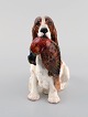 Royal Doulton porcelain figurine. Cocker spaniel with pheasant. 1930