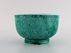 Wilhelm Kåge for Gustavsberg. Argenta art deco bowl in glazed ceramics. 
Beautiful glaze in shades of green. 1940s.

