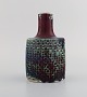 Stig Lindberg for Gustavsberg Studiohand. Vase in glazed ceramics. Beautiful 
glaze in dark purple and turquoise shades. Mid 20th century.

