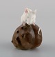 Royal Copenhagen porcelain figurine. Mouse on Chestnut. Early 20th century. 
Model number 511.
