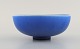 Berndt Friberg for Gustavsberg. Bowl on foot in glazed ceramics. Beautiful glaze 
in shades of blue. 1950s.
