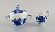 Royal Copenhagen Blue Flower Curved. Sugar bowl and creamer in porcelain with 
floral decoration.
