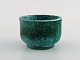 Wilhelm Kåge for Gustavsberg. Argenta art deco bowl in glazed ceramics. 
Beautiful glaze in shades of green. 1950/60