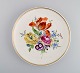Antik Meissen tallerken i håndmalet porcelæn med blomstermotiver. 
18/1900-tallet.

