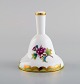 Herend table bell in hand-painted porcelain with flowers and gold decoration. 
1980s.

