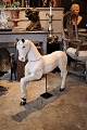 Swedish 1800 century  horse in carved wood with scraped off-white color and a 
super fine patina.
H:76cm. L:88cm.
