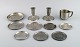 Just Andersen. Two candlesticks, eight bottle trays and a mug in pewter. 1930 / 
40